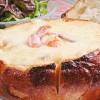 パンケースに入った魚貝グラタン　1,300円（2019年9月30日までの料金）